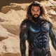 Jason Momoa as Arthur Curry/Aquaman in Aquaman and the Lost Kingdom's new black-and-silver 'Stealth' suit.
